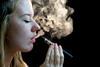 Woman smoking an ecig