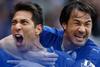 Leicester City forwards Leonardo Ulloa and Shinji Okazaki celebrate a win (L - R)
