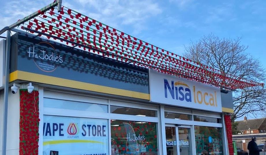 Nisa retailer and community create poppy display Features and
