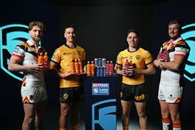 Super League players from Bradford Bulls and Castleford Tigers celebrate new Boost partnership with Super League (credit SW Pix)