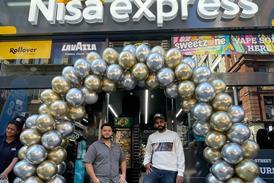 Sam and Abdul outside Nisa Express