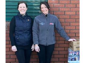 Ukraine help_Connollys Spar Dunclug_Spar colleague Bronagh Croskery hands donation to Karen Brownlow