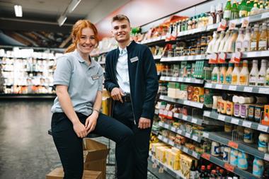 Two young store employees
