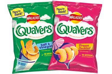 Two large bags of Quavers - a green salt & vinegar one and a pink prawn cocktail one.