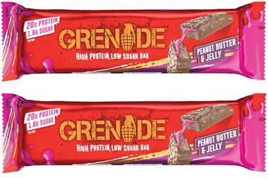 Grenade chocolate-coated protein bar with pink and red packaging