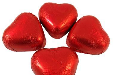 Red foil-wrapped heart chocolates for Valentine's Day