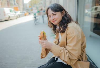 GettyImages_Eating sandwich outside_Credit Oleh_Slobodeniuk
