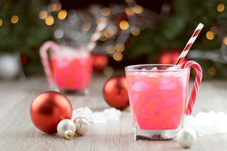 GettyImages_Pink cocktails with candy cane and baubles_Credit dropStock
