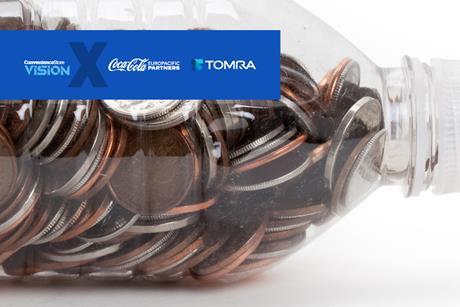 A plastic bottle filled up with pennies