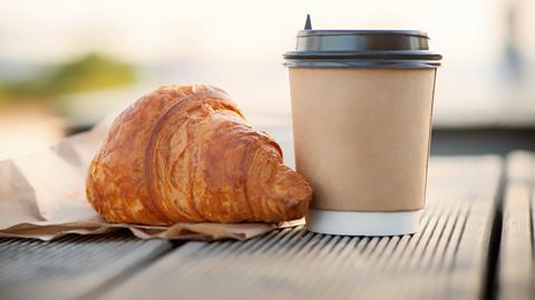 A take away coffee and croissant