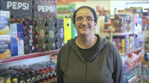 Supplier visits winner of competition in convenience store