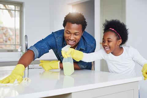 GettyImages_Family cleaning surface_Credit Dean Mitchell