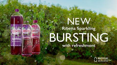 Ribena Sparkling advert showing bottle of drink in front of blackcurrant bushes