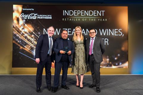 Independent retailer of the year- New zealnd and wines with presentor and host