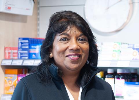 Costcutter retailer Sue stood inside her store