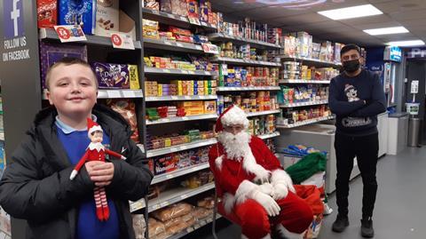 MAIN PIC_Santa with kids in store