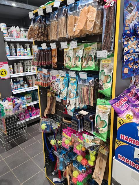 Pet treats and toys on display at a Nisa convenience store.