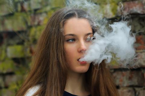 GettyImages_Young girl vaping_Credit AleksandrYu