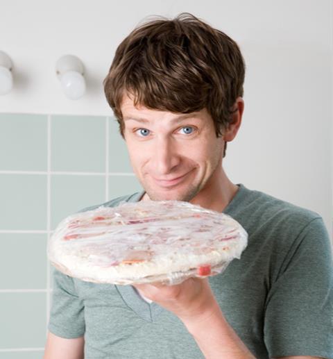 GettyImages_Man with frozen pizza_Credit Image Source