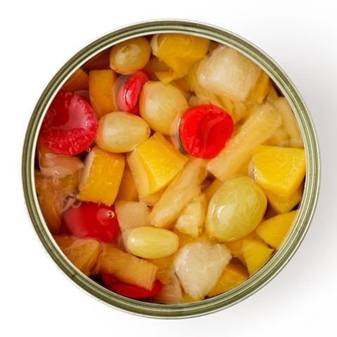 Birds eye view of a round tin filled with fruit pieces