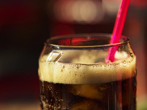 fizzy carbonated cola with straw co2