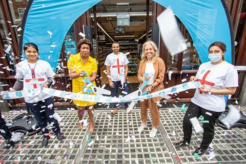 MIND chairman cutting ribbon at Baker Street store opening