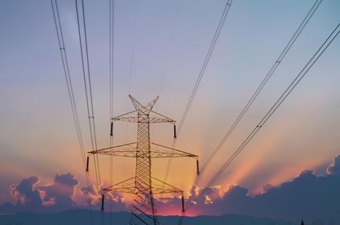 Getty_Energy_Electricity pylon at sunset_Credit arismart