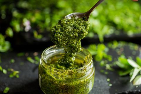 Green pesto in a jar