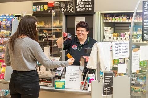 Central England Co-op staff serving customer