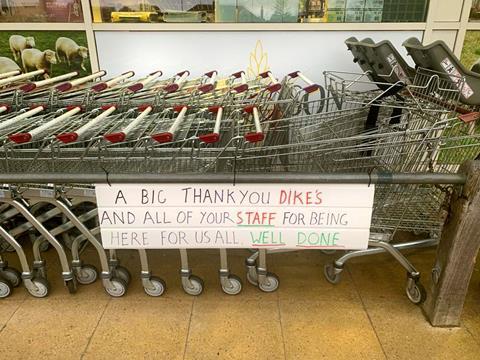 A large sign by the trolleys thanks Dike & Son for its support