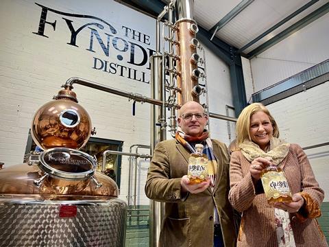 Paul and Tiffany Kerruish in the new Distillery with Glashtyn Spiced Manx Rum