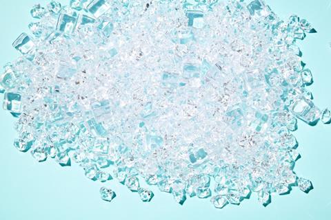 A large heap of ice on a blue background