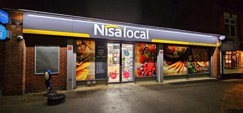 nisa local store front at night evington