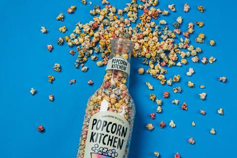 Rainbow Sweet & Salt popcorn giant - lifestyle - pop from top